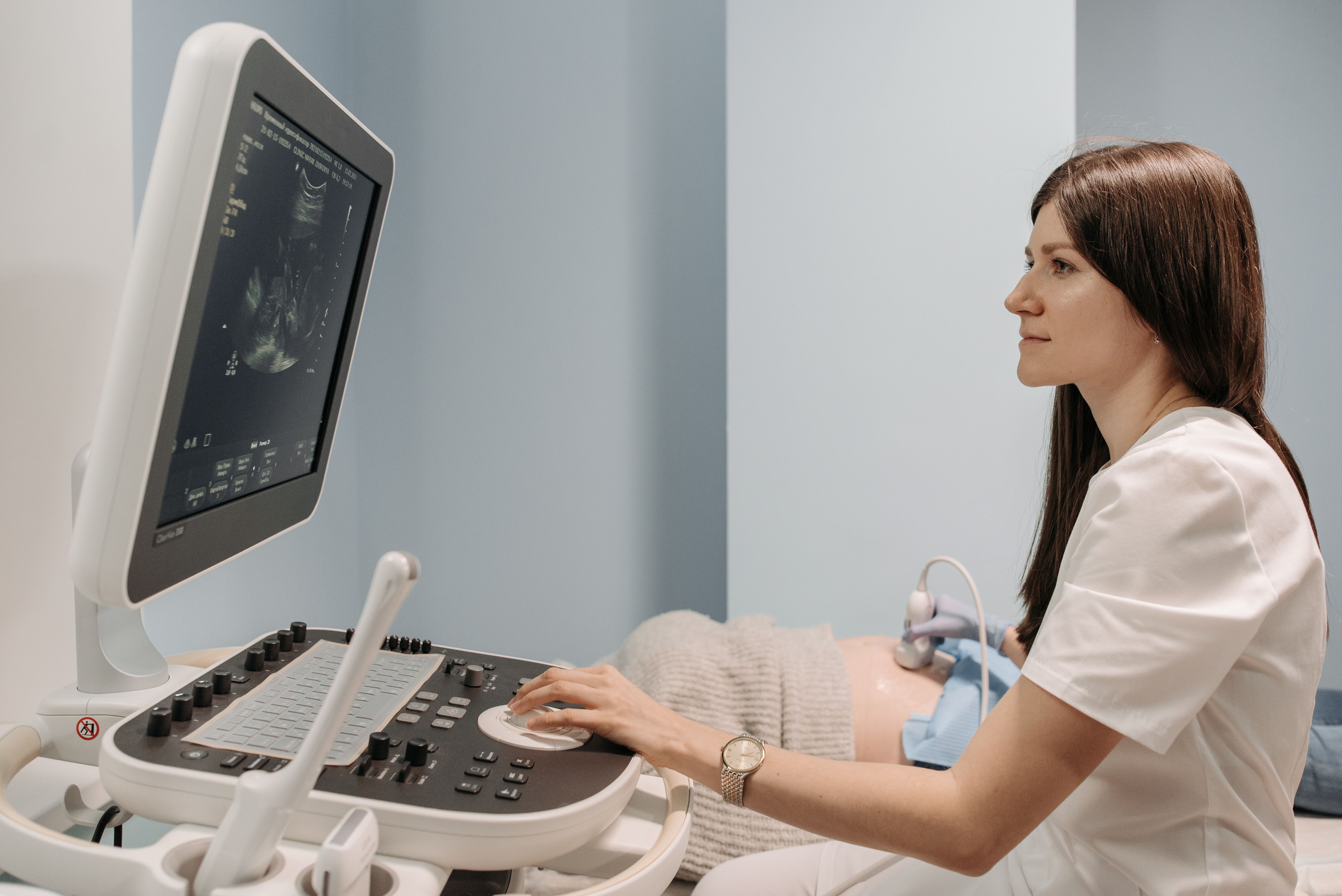 Clinician performing an ultrasound examination